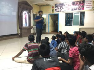 Children listening to the address
