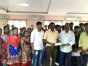 Thiru. H. Govindaraju, Trustee handing over cheque to the Director of Excel College of Engineering