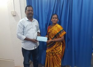 Trustee handing over the cheque