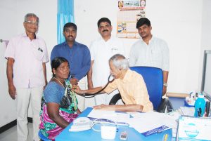 Dr,. Mohamed examining the patient during Medical Camp.